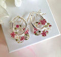 Raspberry ripple Bloom Flower hoop earrings.