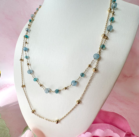 Gold layered blue bead necklace.