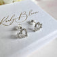 925 sterling silver CZ Hollow heart stud earrings.