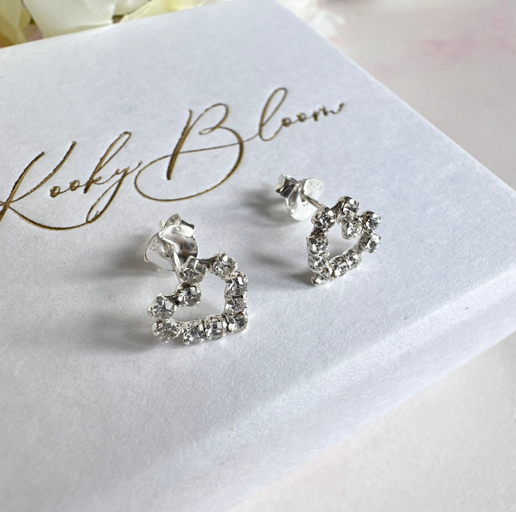 925 sterling silver CZ Hollow heart stud earrings.