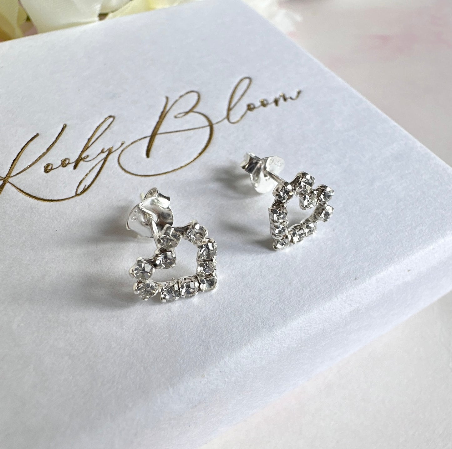 925 sterling silver CZ Hollow heart stud earrings.