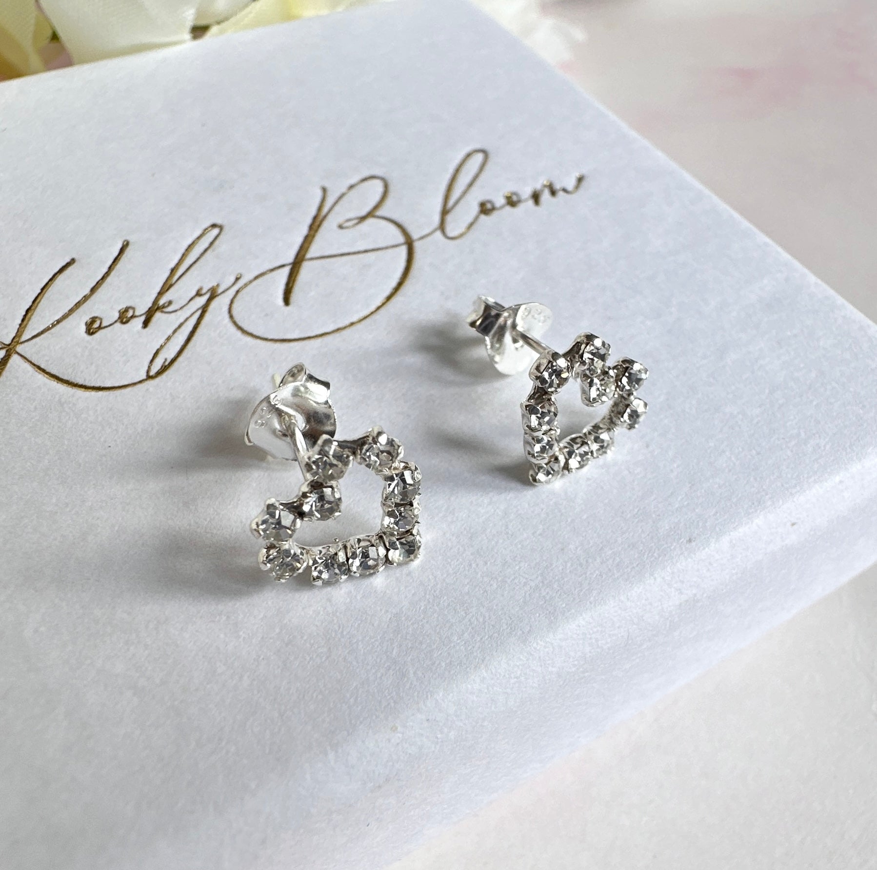 925 sterling silver CZ Hollow heart stud earrings.