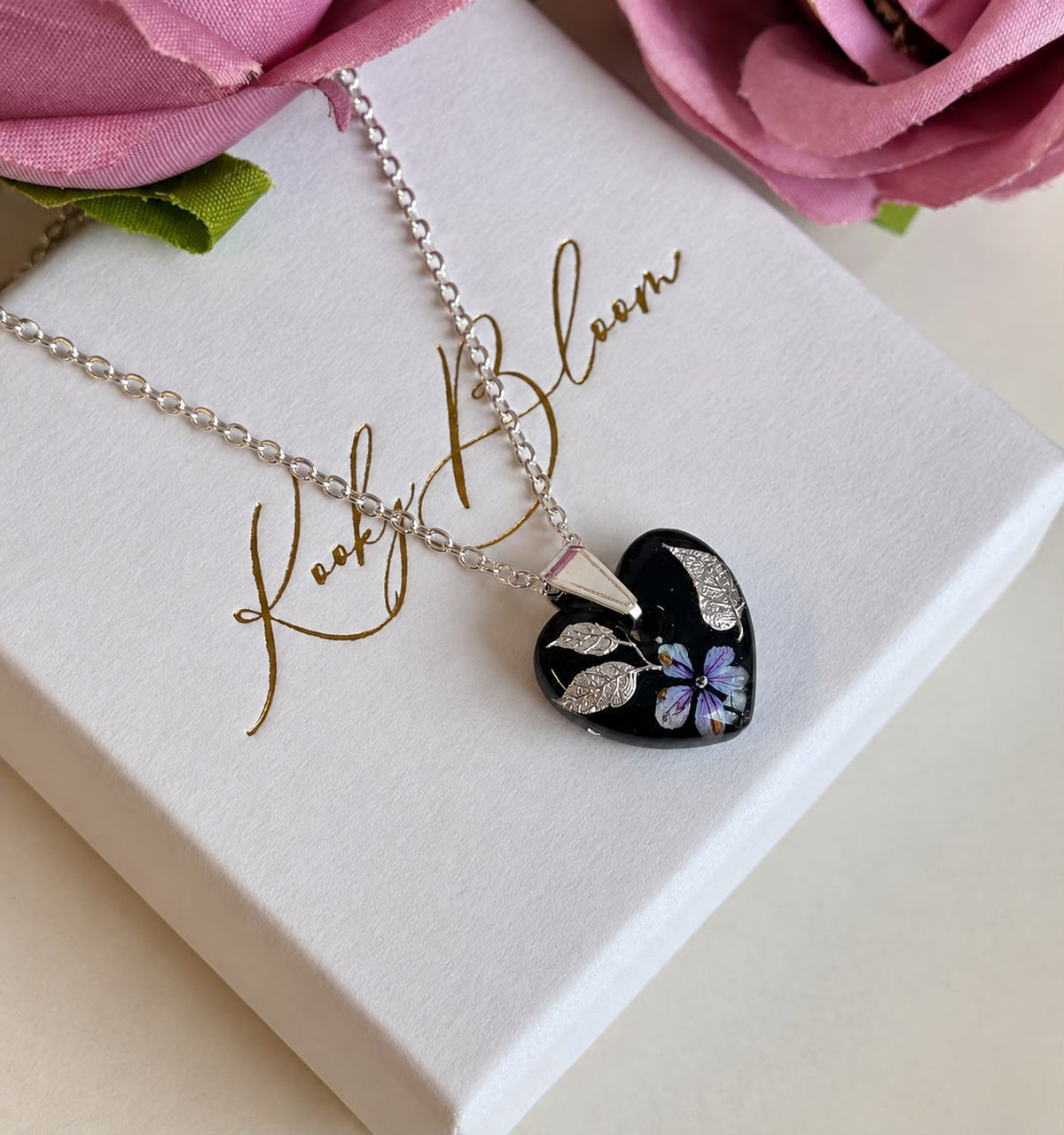Silver Mini Mystical bloom heart necklace.