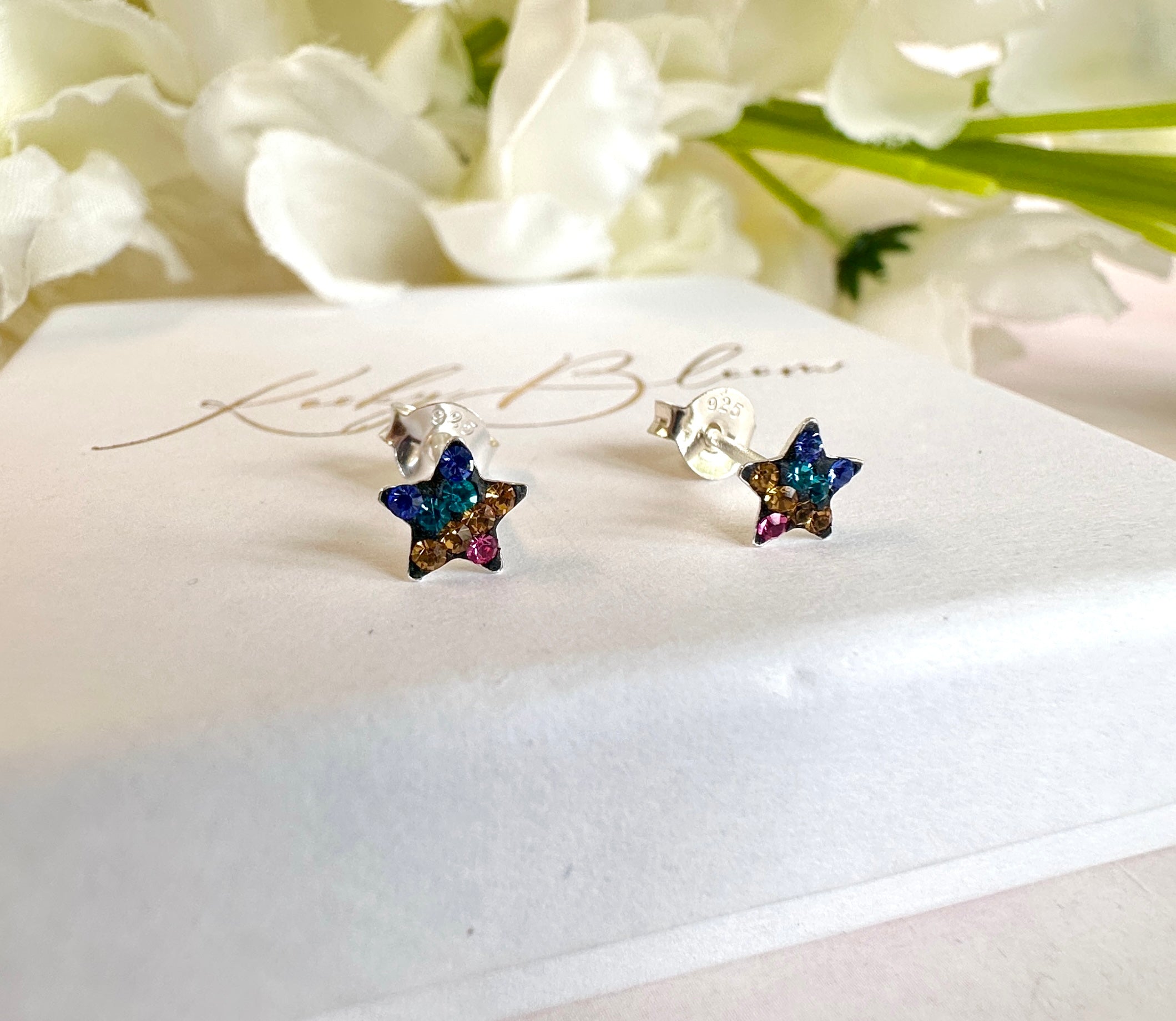 925 sterling silver Tiny black rainbow diamanté Star studs.