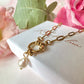 Gold Pearl paperclip chain necklace.