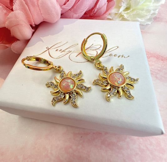 Gold Peach Opal Sun Huggie earrings.