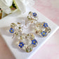 Forget me not Flower Bloom drop stud earrings.