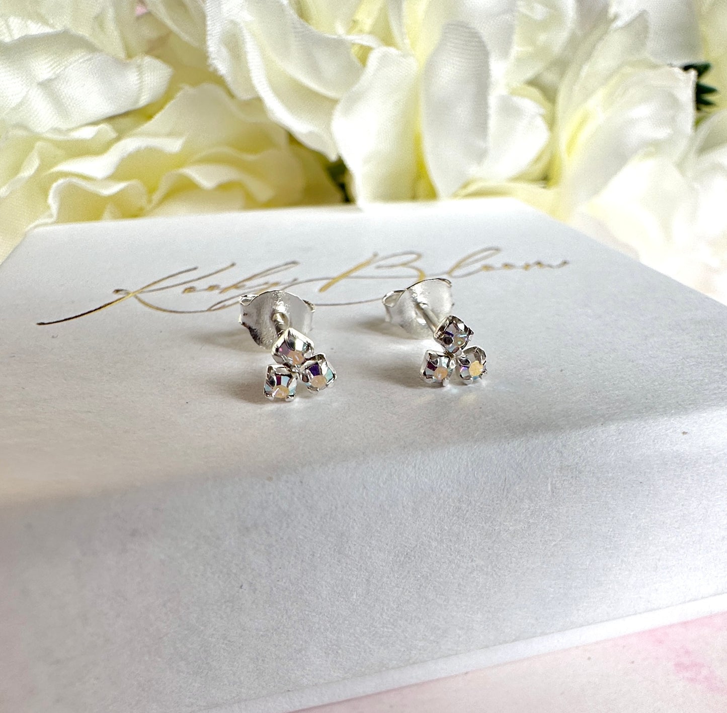 925 sterling silver AB CZ Tri Stone stud earrings.