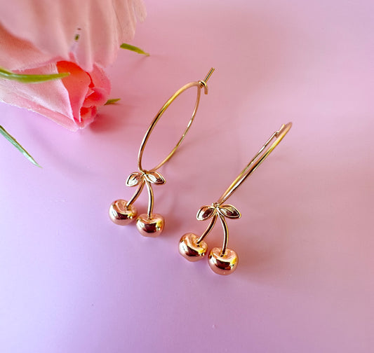 Gold Cherry Hoop earrings.