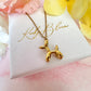 Gold Balloon Dog Necklace.