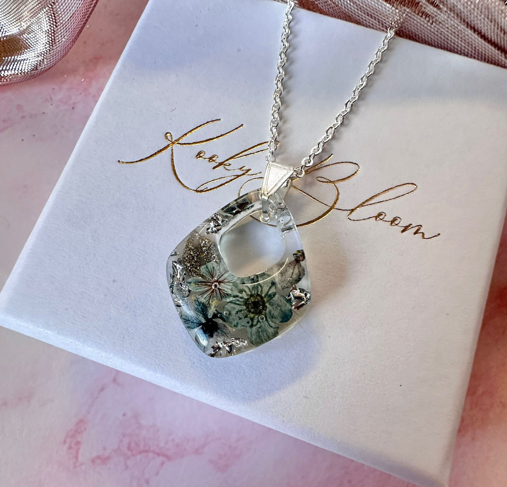 Silver Frosted floral diamond necklace.