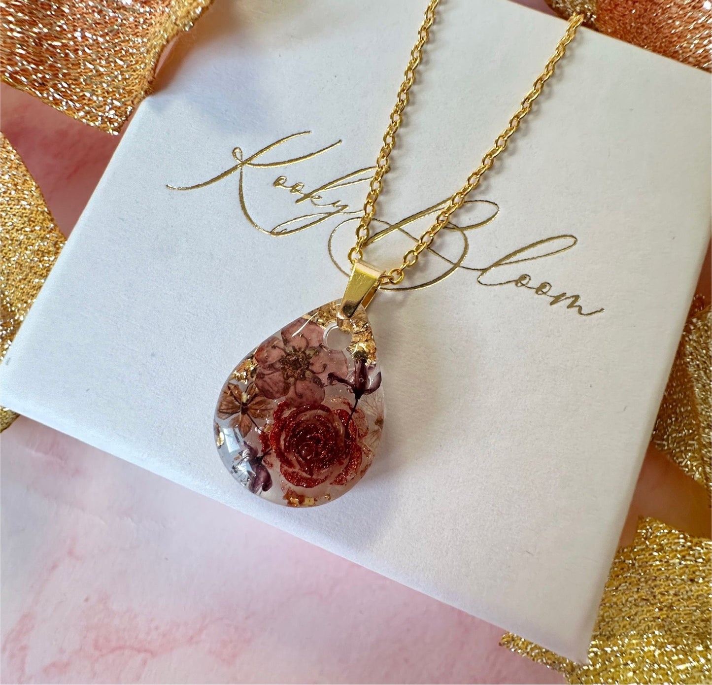 Gold chocolate teardrop necklace.