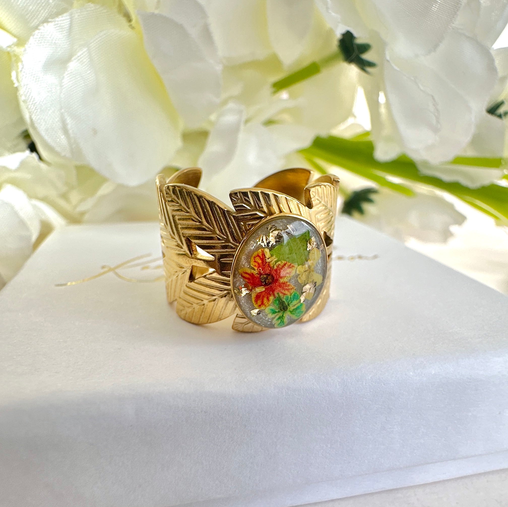 Gold wide Green orange Bloom Leaf cuff ring.