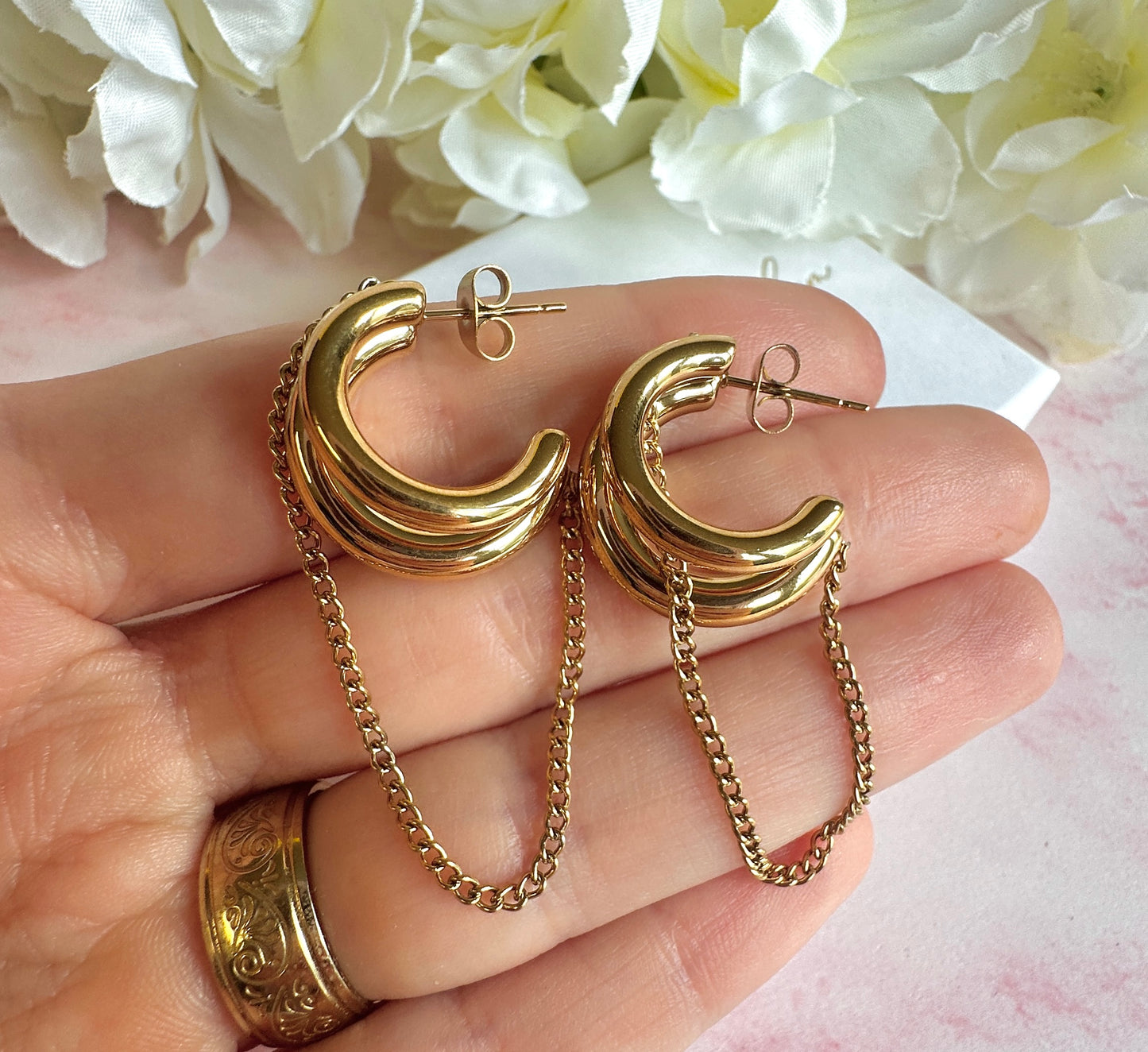 Gold chunky chain loop stud hoop earrings.