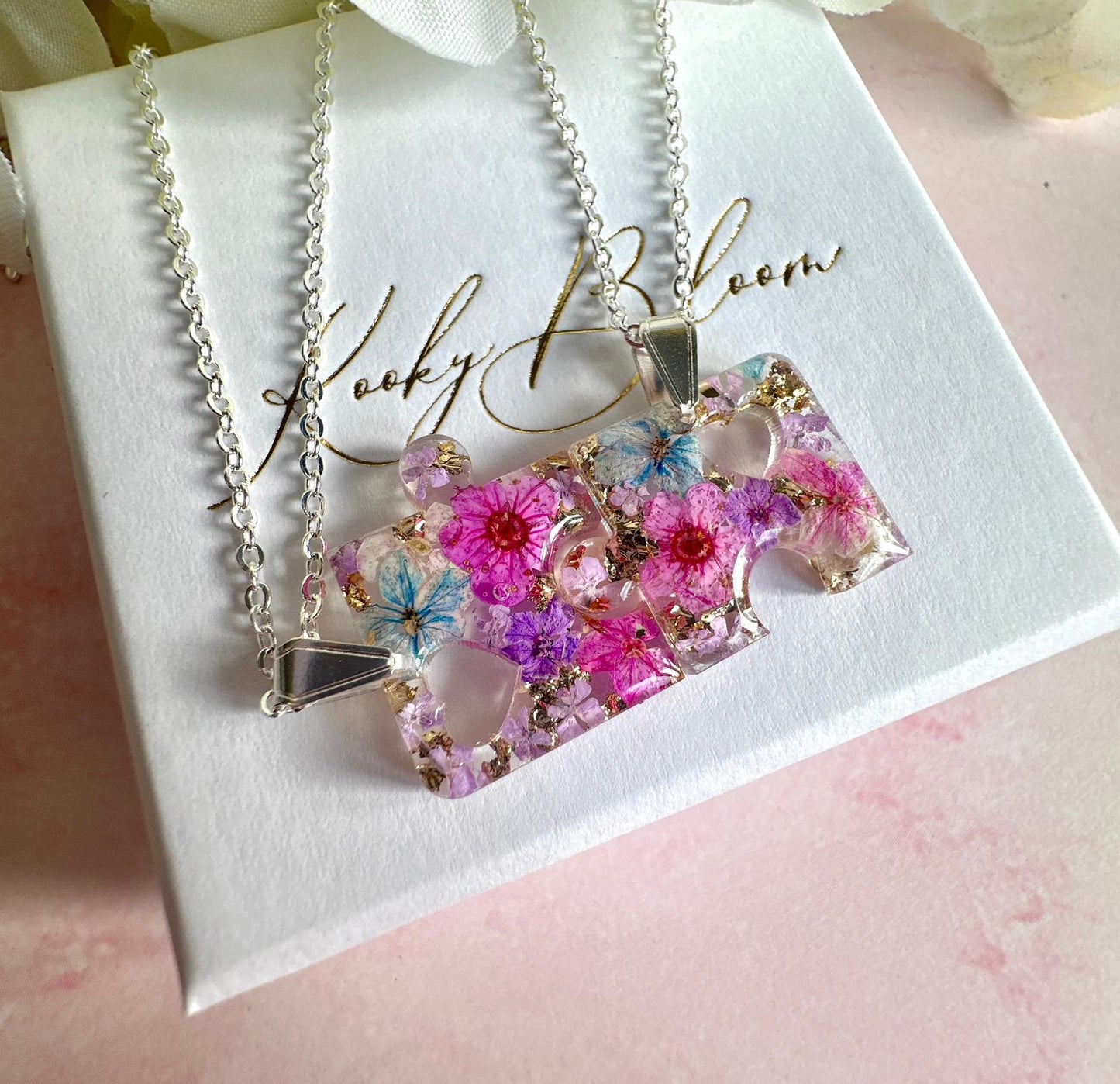 Silver real flower Puzzle piece Necklace.