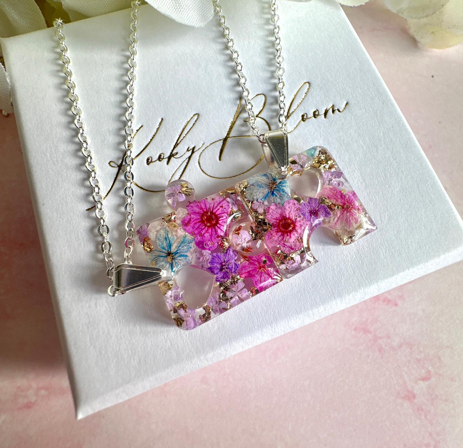 Silver real flower Puzzle piece Necklace.