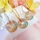 Gold Pastel confetti flower Heart necklace.