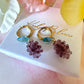 Purple grape gold earrings.