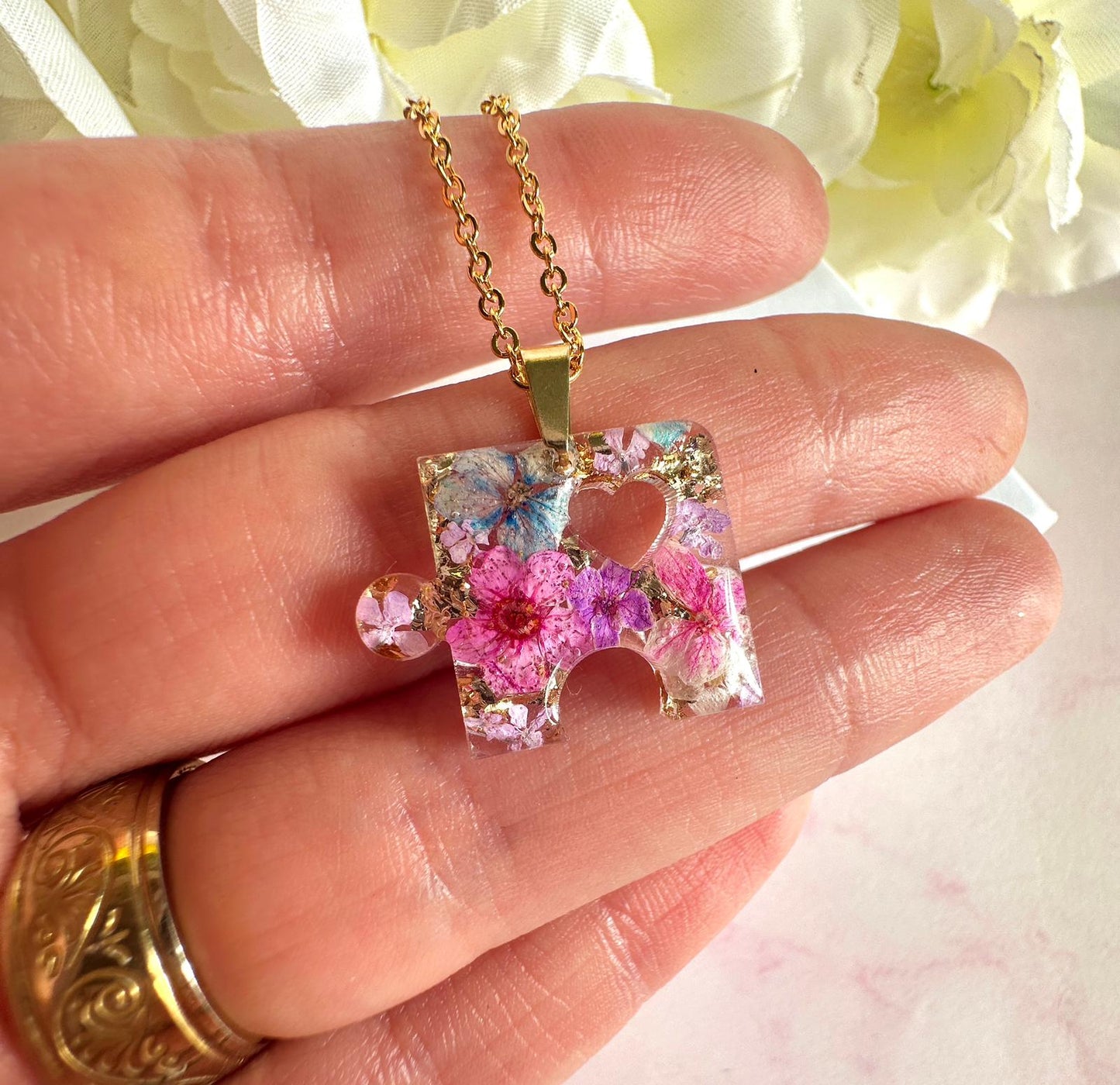 Gold real flower Jigsaw puzzle piece necklace.