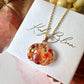 Gold Pumpkin bloom necklace.