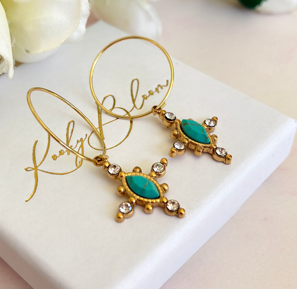 Gold Turquoise crystal cross hoop earrings.