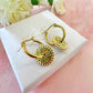 Gold star flower Green Disc earrings.