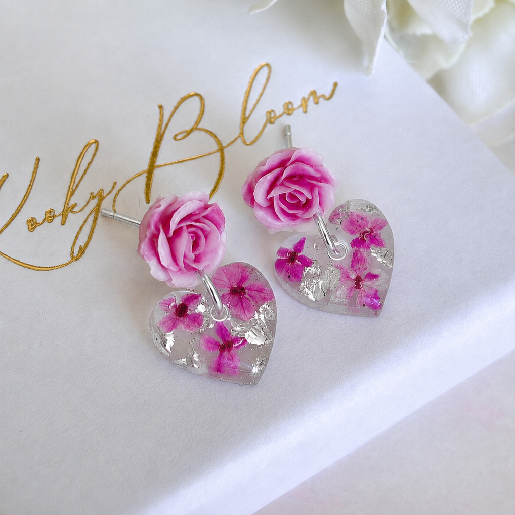 Pink Rose Drop Heart bloom stud earrings.