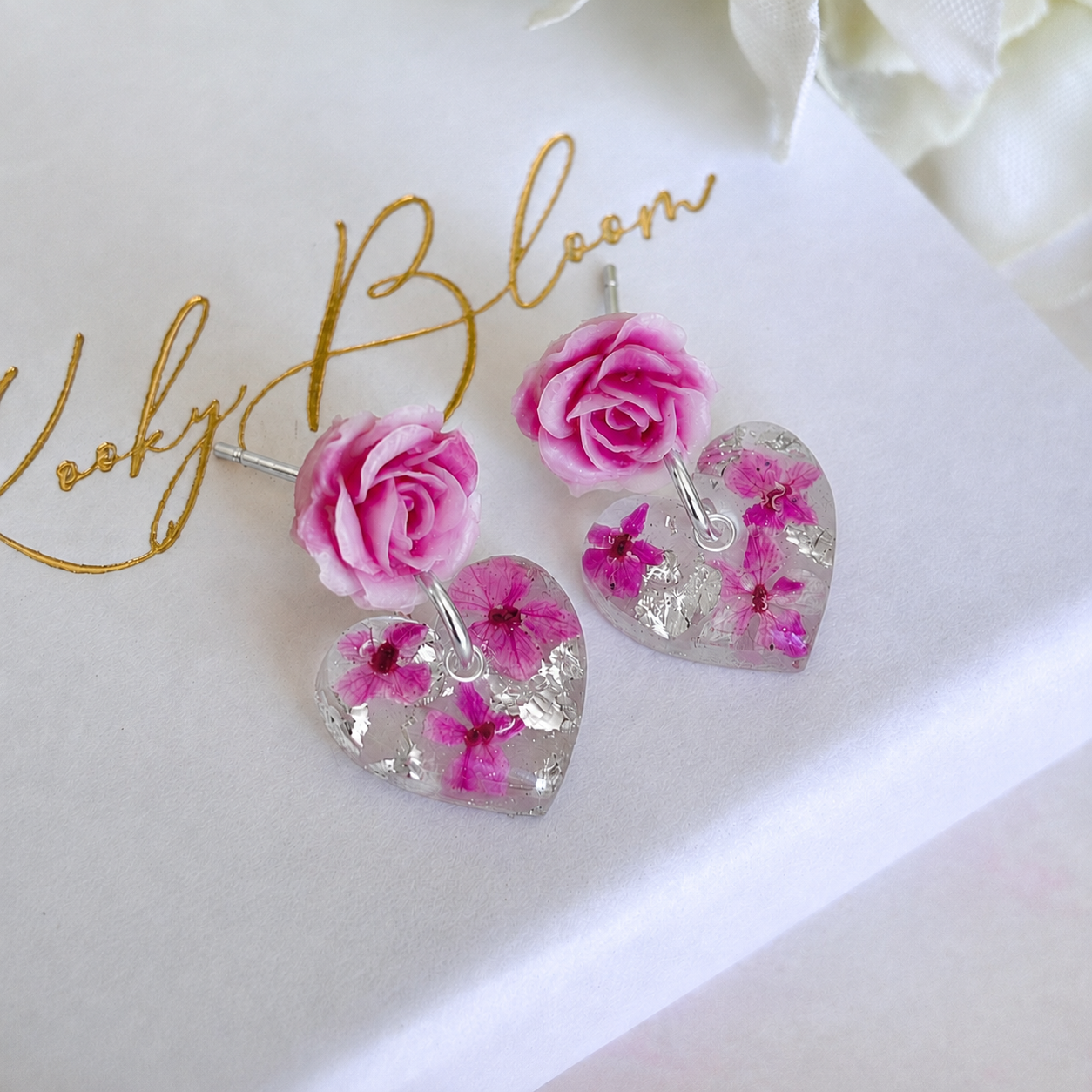 Pink Rose Drop Heart bloom stud earrings.