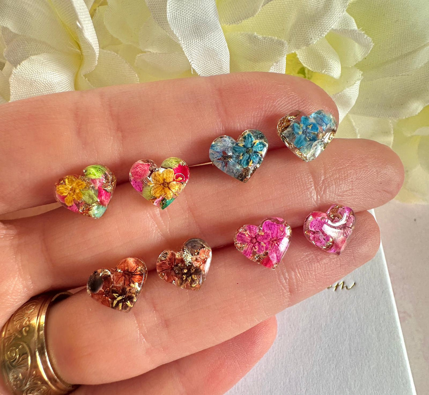 Teeny Bloom heart 925 sterling silver stud earrings.