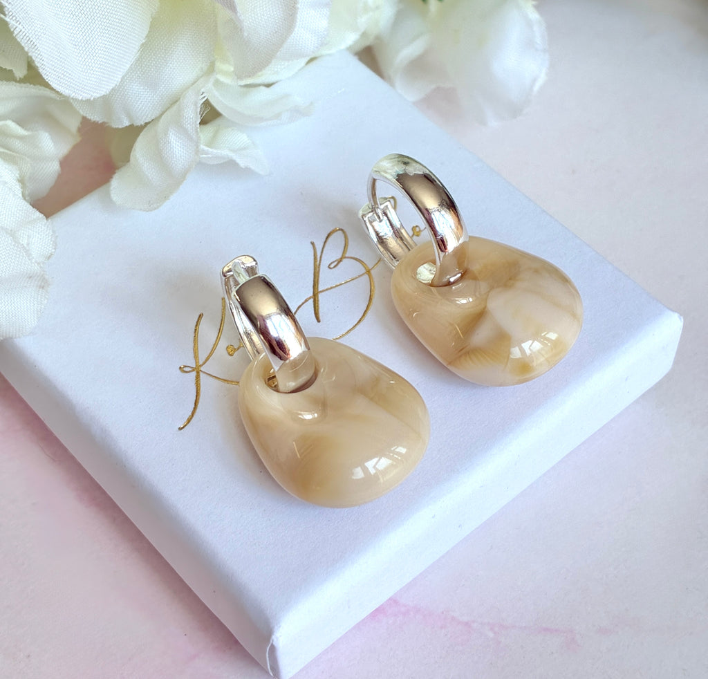 Silver chunky stone earrings.