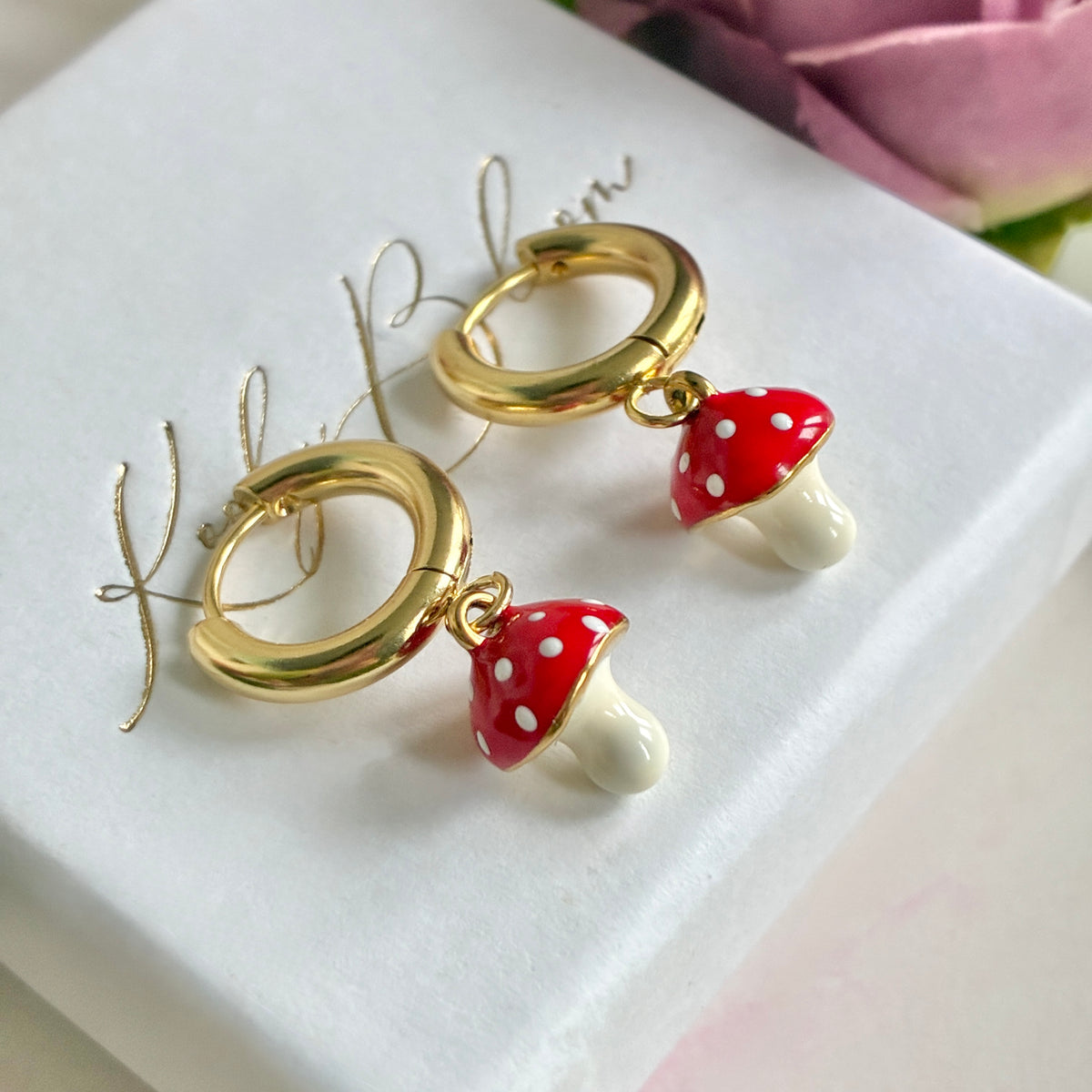 Gold Enamel Toadstool chunky huggie earrings.