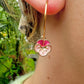Pink Voila flower gold hoop earrings.