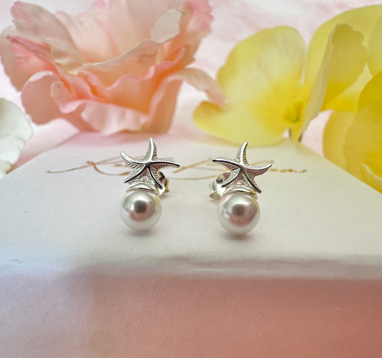 925 sterling Silver Pearl Starfish stud earrings.