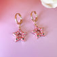 Metallic Pink Diamanté Star Gold Huggie earrings.