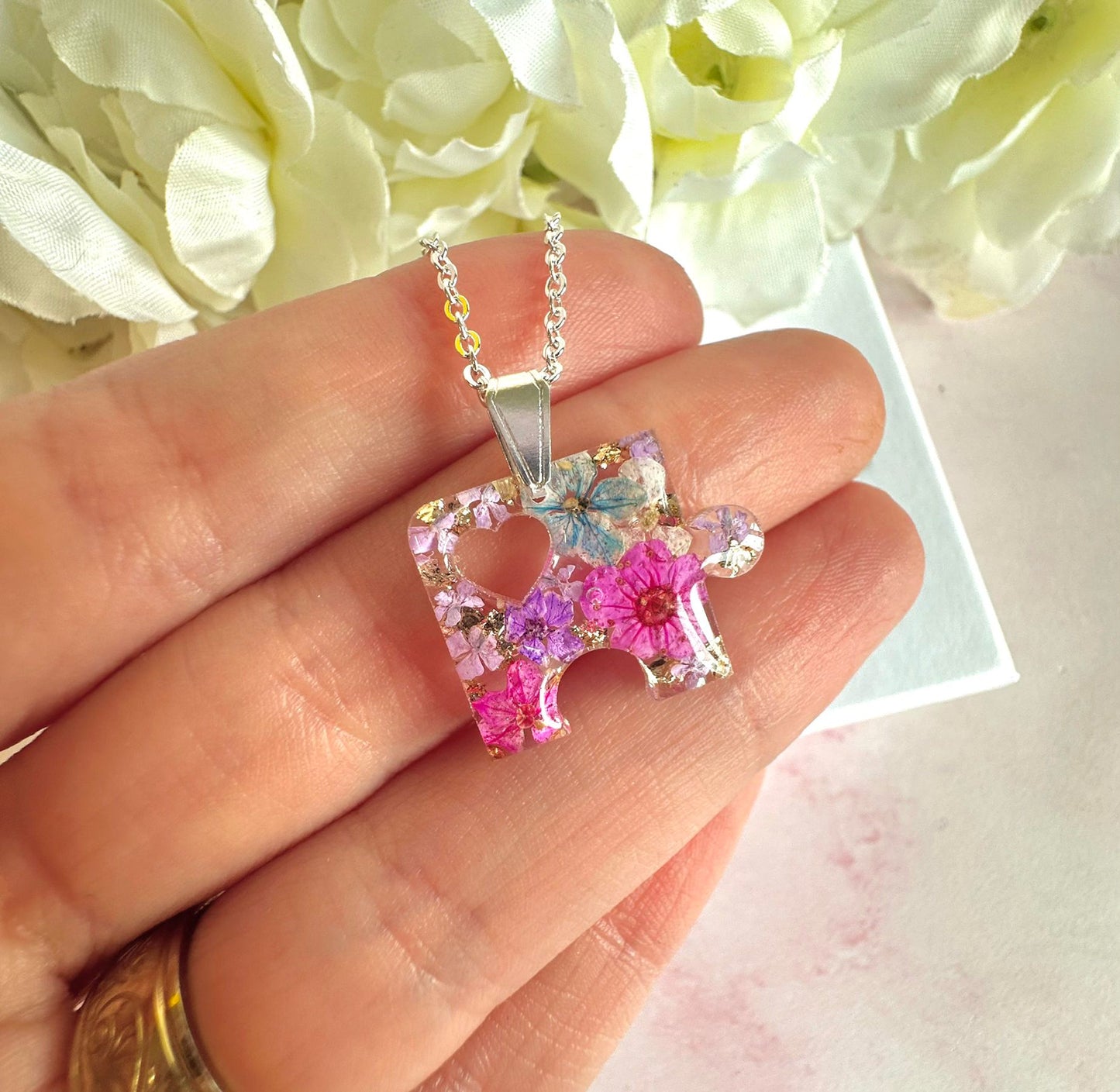 Silver real flower Puzzle piece Necklace.