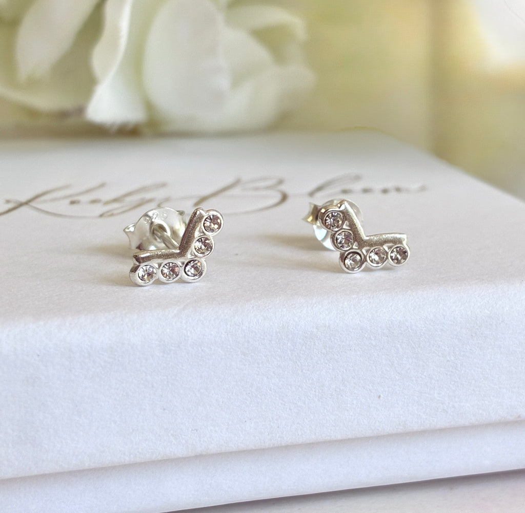925 sterling silver V Diamanté stud earrings.