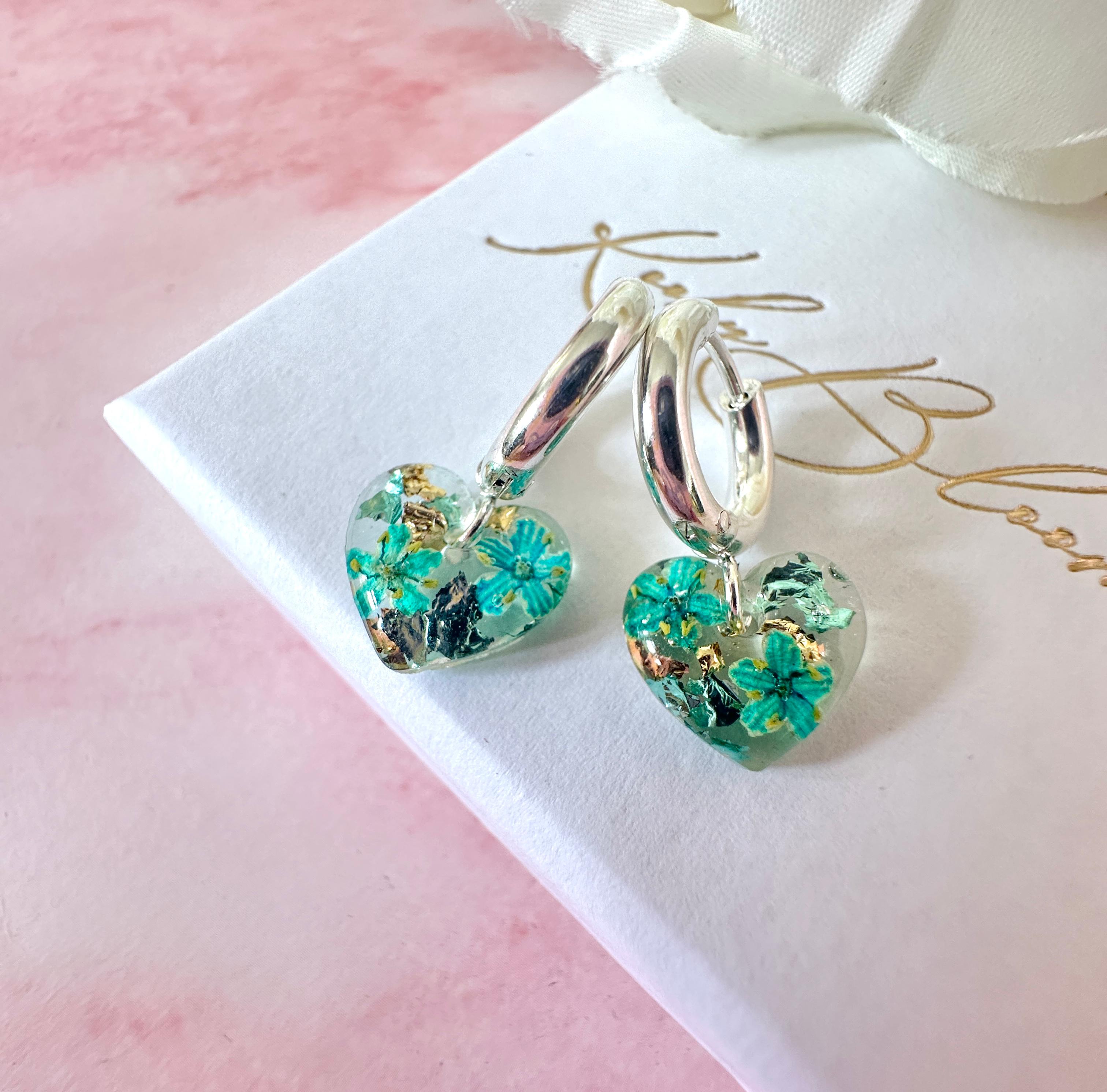 Silver Tiny Turquoise bloom heart Huggies earrings.