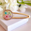 Large Pastel flower gold alligator hair clip.