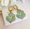 Gold Blue enamel flows chunky huggie hoop earrings.