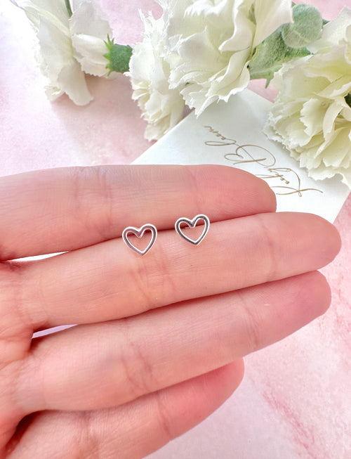 925 Sterling silver Hollow Heart stud earrings.
