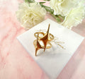 Gold statement double star adjustable ring.