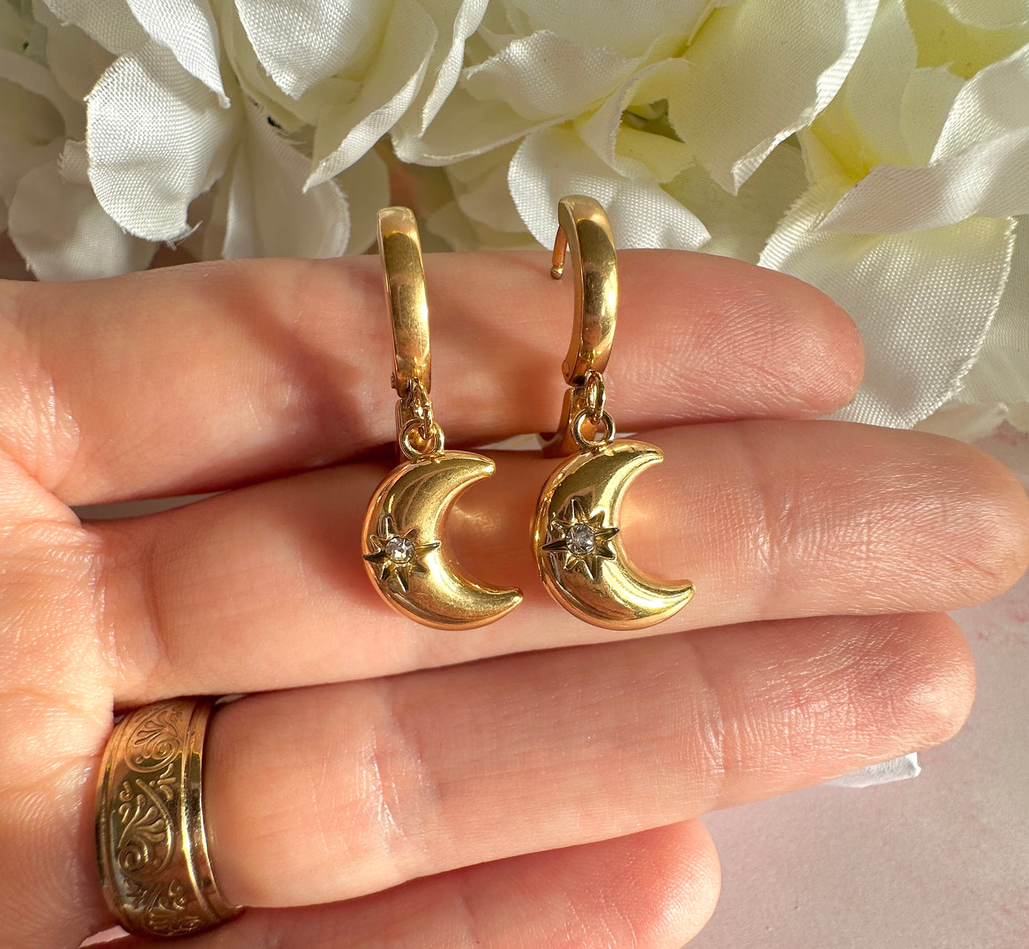 Gold Moon Cz huggie hoop earrings.