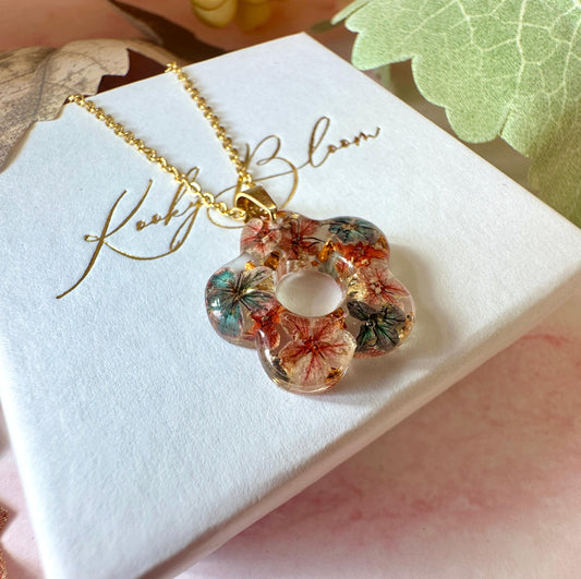 Gold Ember Bloom flower necklace.