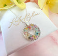 Silver Pastel confetti flower Heart necklace.