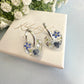 Mini Powder Blue Forget me not heart hoop earrings.
