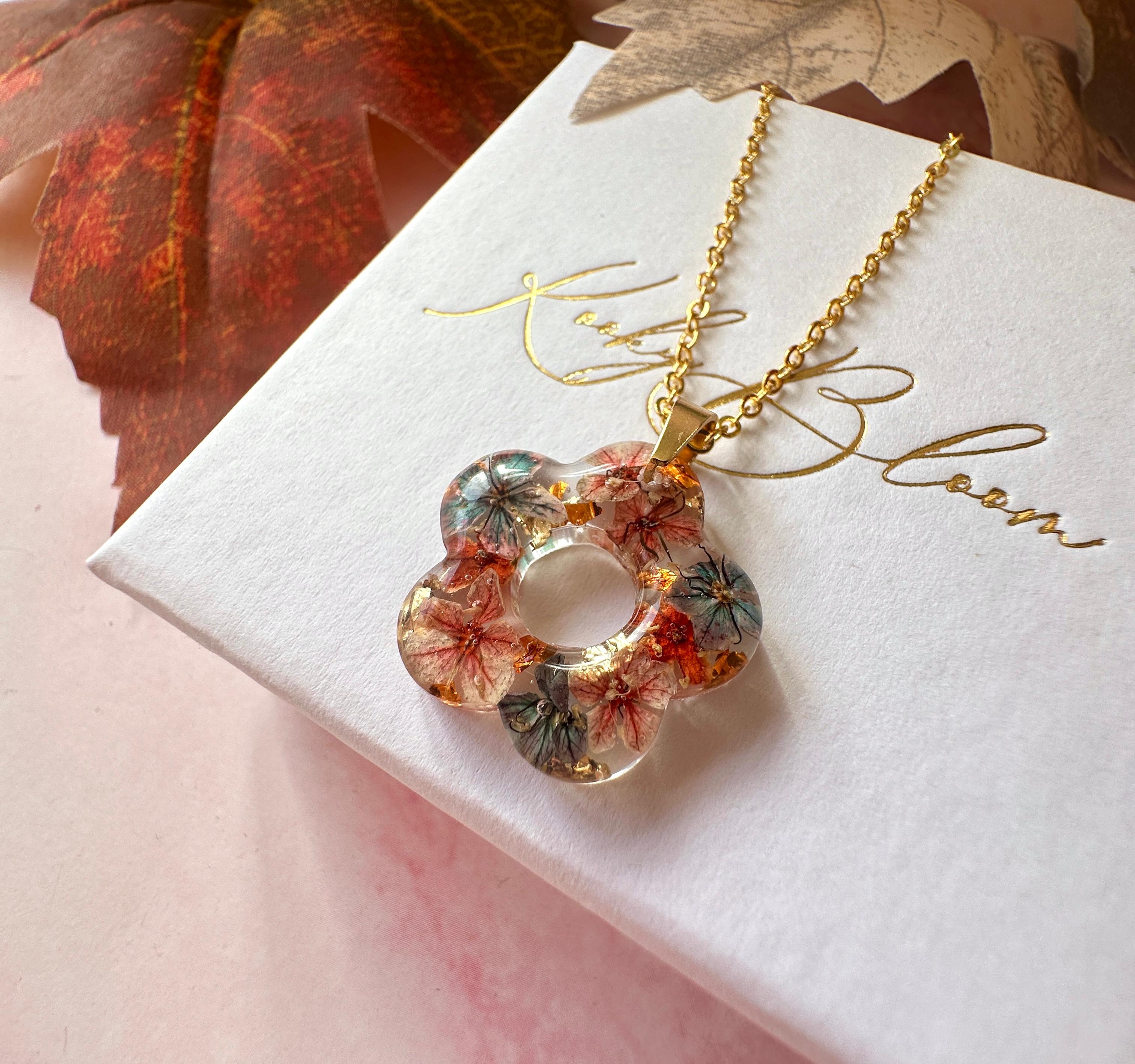 Gold Ember Bloom flower necklace.