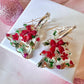 Bloom bow Christmas Tree earrings.