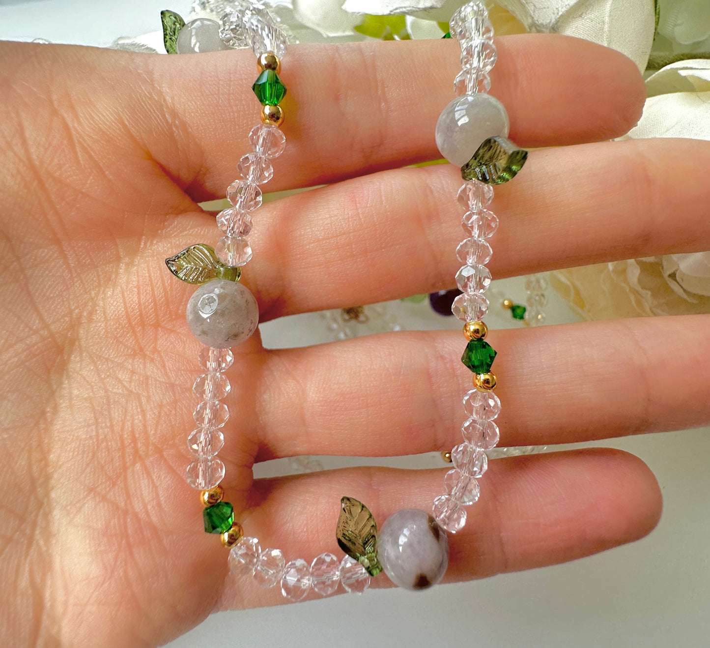Glass beaded gemstone fruit necklace.
