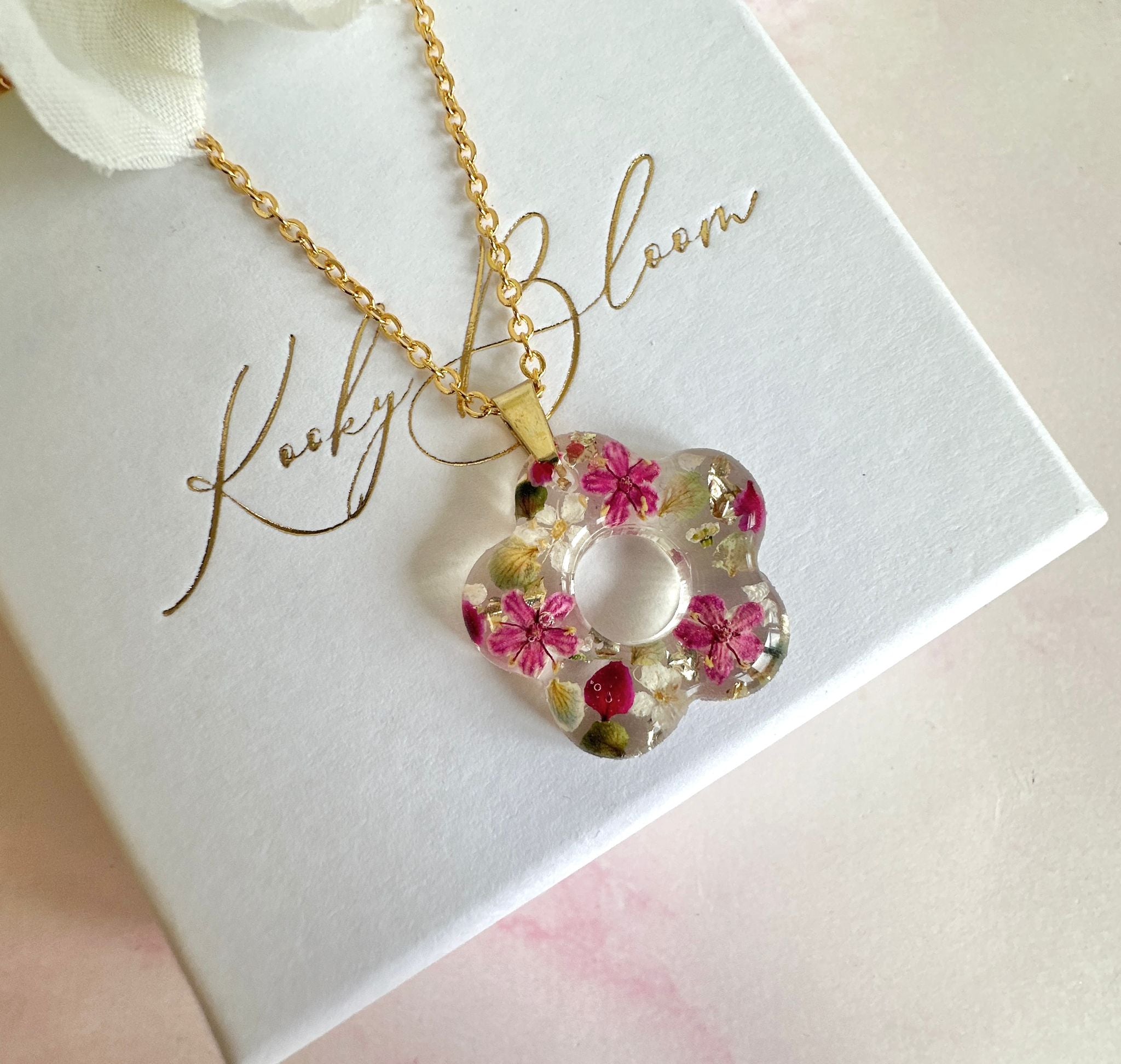 Gold raspberry ripple Bloom Flower necklace.