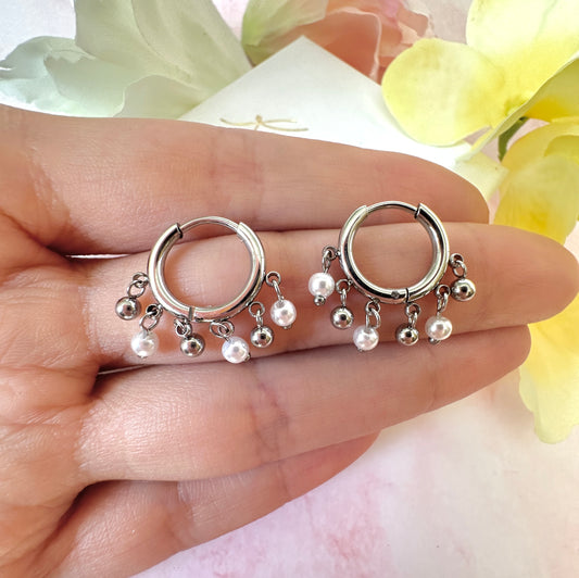 Silver Pearl chandelier huggie hoop earrings.